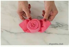 How to make rose from napkins with your hands