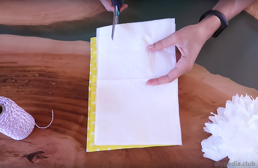 cutting a napkin